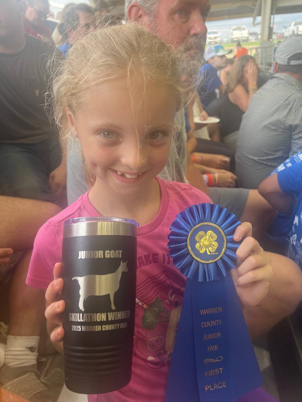 Brown family with goats